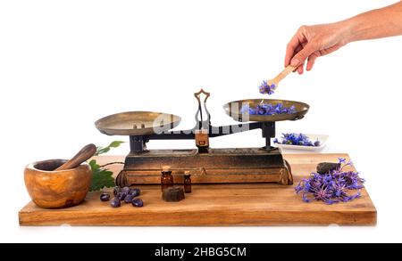 Roberval Balance vor weißem Hintergrund Stockfoto