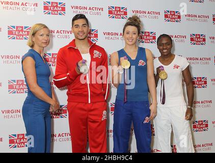 Sophia Warner, Louis Smith MBE, Jade Jones MBE und Nicola Adams MBE nehmen am Team Event 2013 im Virgin Active Gym im Aldersgate in London Teil. Stockfoto