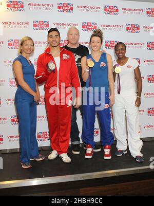 Sophia Warner, Louis Smith MBE, Iwan Thomas, Jade Jones MBE und Nicola Adams MBE nehmen am Team Event 2013 im Virgin Active Gym im Aldersgate in London Teil. Stockfoto