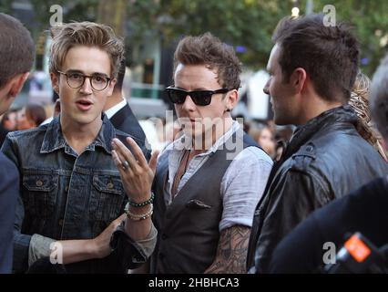 Tom Fletcher, Danny Jones und Harry Judd von McFly besuchen die One Direction „This is US“-Weltpremiere im Empire, Leicester Square in London. Stockfoto