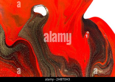 Flüssige Textur aus rotem, schwarzem und goldenem Marmor. Stockfoto