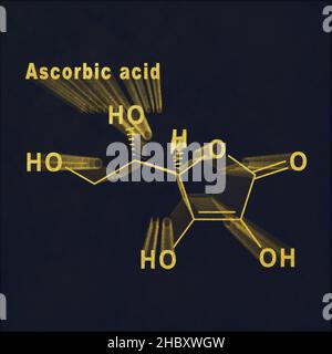 Ascorbinsäure strukturelle chemische Formel Gold auf dunklem Hintergrund Stockfoto