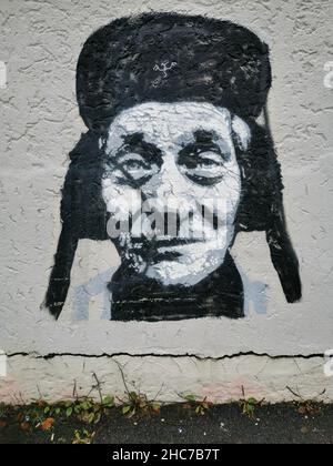 Graffiti eines alten Mannes mit Uschanka auf dem Kopf, Bergen, Norwegen Stockfoto
