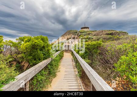 Wolkiger Himmel über der Küste des Portsea Surf Beach Stockfoto