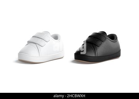 Schwarze und weiße Babyschuhe, Mockup, halbgedrehte Ansicht Stockfoto