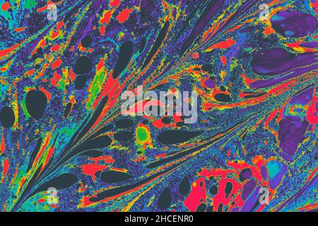 Ebru technique painting in blue and red tones Stockfoto