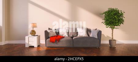 Weißes Sofa mit zwei Kissen im leeren Raum vor der leeren Wand Stockfoto