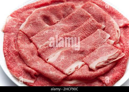 Rohes Rindfleisch japanisches schwarzes Wagyu-Fleisch isoliert auf weißem Hintergrund Stockfoto