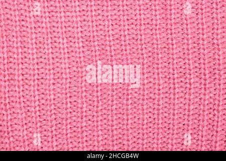 Struktur aus rosa Stricktuch Stockfoto