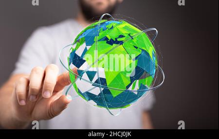 3D Darstellung des Erdsymbols auf dem Hintergrund eines Personen-/Umweltkonzepts Stockfoto