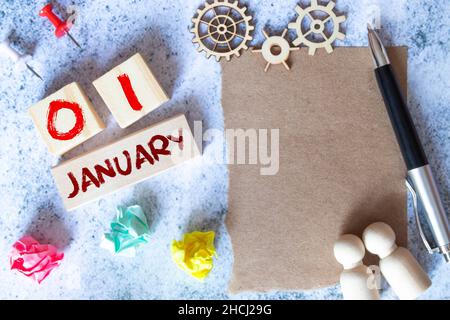 Januar 1st. Tag 1 des Monats, Kalender auf Lehrer Arbeitsplatz Hintergrund. Winterzeit. Stockfoto