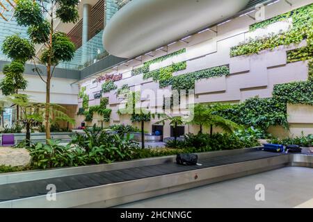 SINGAPUR, SINGAPUR - 10. MÄRZ 2018: Gepäckkarussells am Flughafen Singapur Changi. Stockfoto