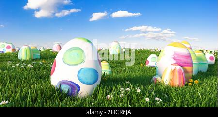 Viele bunte ostereier im Gras einer Wiese zu ostern Stockfoto
