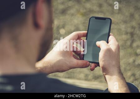 Mann mit mobilen Smartphone Stockfoto