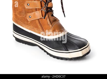 PAC Stiefel oder Schneestiefel mit Gummiunterschale, wasserfestem Leder und Schuhspitze. Perspektivische Ansicht. Warme hellbraune und schwarze Winterschuhe mit Stockfoto