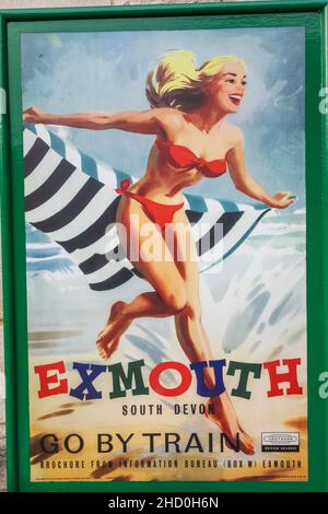 England, Dorset, Isle of Purbeck, Corfe Castle, der historische Bahnhof, Vintage Railway Poster Advertising Service to Exmouth in South Devon Stockfoto