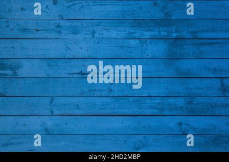 Blau bemalte Holzplanken Wandhintergrund Stockfoto
