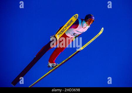 Mikhail Yesin (RUS), der bei den Olympischen Winterspielen 1994 im Einzel-Skispringen der Herren K120 antritt Stockfoto