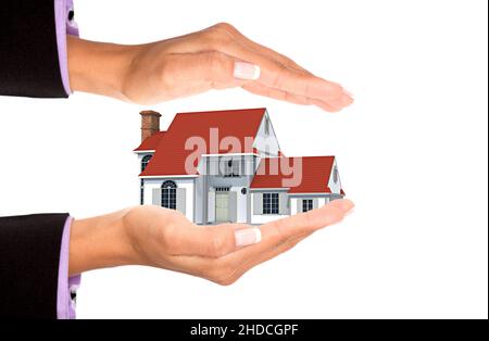 Hand mit Einfamilienhaus, Freisteller, weisser Hintergrund, Stockfoto