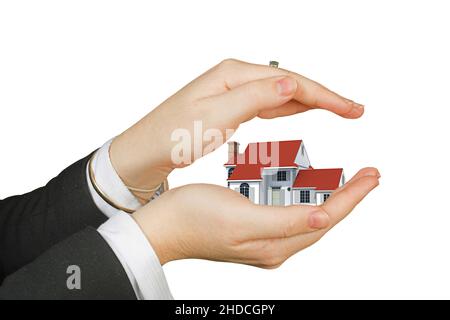 Hand mit Einfamilienhaus, Freisteller, weisser Hintergrund, Stockfoto