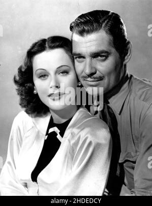 CLARK GABLE und HEDY LAMARR in DER BOOM-STADT (1940), Regie: JACK CONWAY. Kredit: M.G.M. / Album Stockfoto