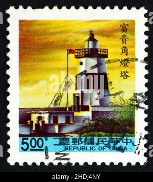 CHINA - UM 1992: Eine in China gedruckte Briefmarke zeigt Fukwei Chiao, Leuchtturm, Taiwan, um 1992 Stockfoto