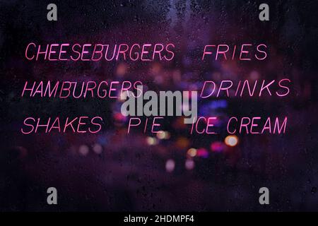 Vintage Neon Sign - Hamburger und Pommes mit Getränken und Kuchen Stockfoto