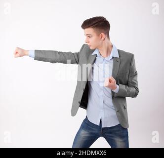 Teenager, stanzen, kampfbereit, jugendlich, Teenager, Jugendliche, Jugendliche, Kampfreidies Stockfoto