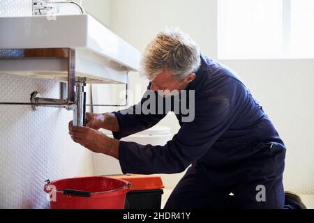 Reparatur, Handwerker, Hausmeister, undicht, Klempner, Verstopfung, Reparaturen, Handwerker, Hausmeister, Hausmeister, Klempner, Okklusionen Stockfoto