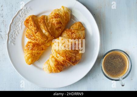 Kaffee, Croissant, Kaffee, Croissants Stockfoto