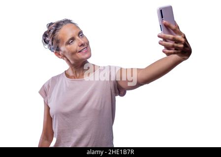 Frau, die mit ihrem Mobiltelefon ein Selfie gemacht hat Stockfoto
