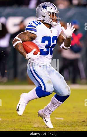 Dallas Cowboys running back Corey Clement (32) wears a Salute to Service  towel and decals on his helmet during warm ups before an NFL football game  against the Denver Broncos, Sunday, Nov.