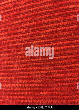 Rote Textur eines Stoffes Stockfoto