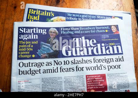 „Empörung, da Nr. 10 den Haushalt für ausländische Hilfe einschlägt, inmitten von Ängsten um die Armen der Welt“ Titelseite der Zeitung Guardian am 14. Juli 2021 in London, England, Großbritannien Stockfoto