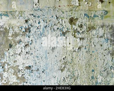 Abstrakte Textur an der alten Wand eines verlassenen Hauses. Ausgezeichneter abstrakter Hintergrund Stockfoto