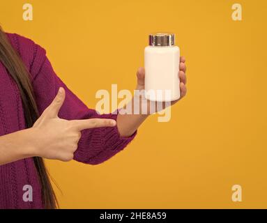 Hand zeigen Finger auf Pille Glas mit Kopierer Platz, Apotheken Stockfoto