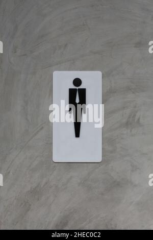 Männliche Toilette Zeichen auf grau vintage Zement Wand Hintergrund für Design in Ihrer Arbeit. Stockfoto