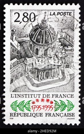 FRANKREICH - UM 1995: Eine in Frankreich gedruckte Briefmarke zeigt das Französische Institut, Zweihundertjahrfeier, um 1995 Stockfoto