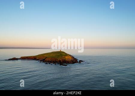 Capel Island im County Cork, Irland, bei Sonnenuntergang an einem ruhigen Wintertag Stockfoto