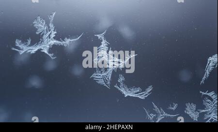 Eiskristalle auf dem Glas Stockfoto