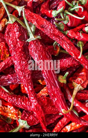 Trockene rote Chili Paprika Makro Hintergrund Stockfoto