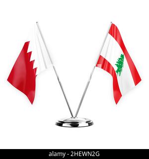 Zwei Tischfahnen isoliert auf weißem Hintergrund 3D Abbildung, bahrain und libanon Stockfoto