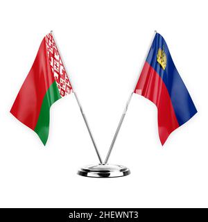 Zwei Tischfahnen isoliert auf weißem Hintergrund 3D Abbildung, weißrussland und liechtenstein Stockfoto