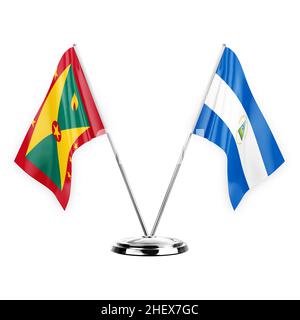 Zwei Tischfahnen isoliert auf weißem Hintergrund 3D Illustration, grenada und nicaragua Stockfoto