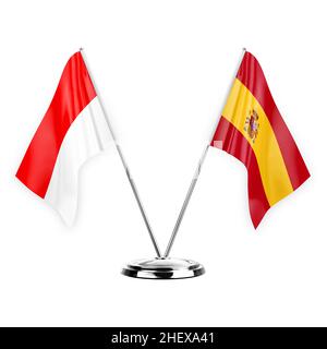 Zwei Tischfahnen isoliert auf weißem Hintergrund 3D Abbildung, indonesien und spanien Stockfoto