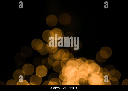 Viele Lichtkreise auf schwarzem Hintergrund Stockfoto