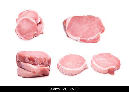 Rohe Schweinefleischstücke isoliert auf weißem Hintergrund. Draufsicht. Stockfoto
