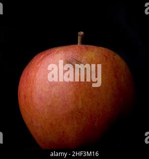 Ein Bad Apple Auf Schwarz Stockfoto