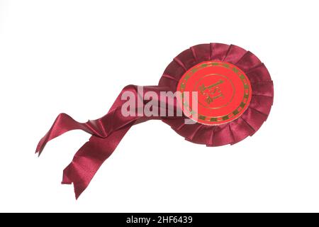 Rosette-Preisabzeichen der Vintage-Gewinnerin für die Best-in-Show oder Gewinn eines Race of Award auf weißem Hintergrund Stockfoto