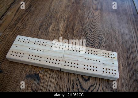 Cribbage, oder Krippe, ist ein Kartenspiel traditionell für zwei Spieler, die das Spielen und Gruppieren von Karten in Kombinationen, die Punkte zu gewinnen. Die Punkte sind Stockfoto